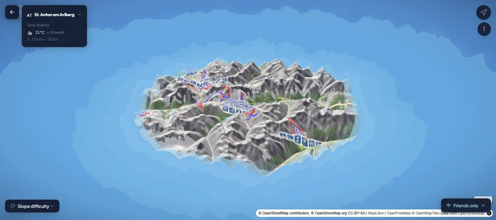 Watchmigo live resort map showing St. Anton, its pistes, resort card, GPS control, compass, and slope difficulty legend